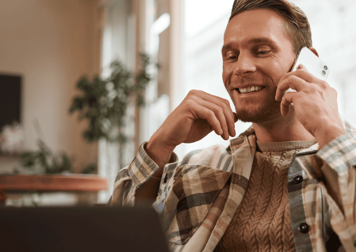 Smiling man on phone call